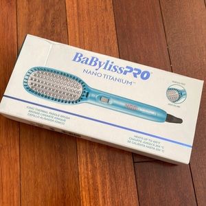 Ionic thermal paddle brush